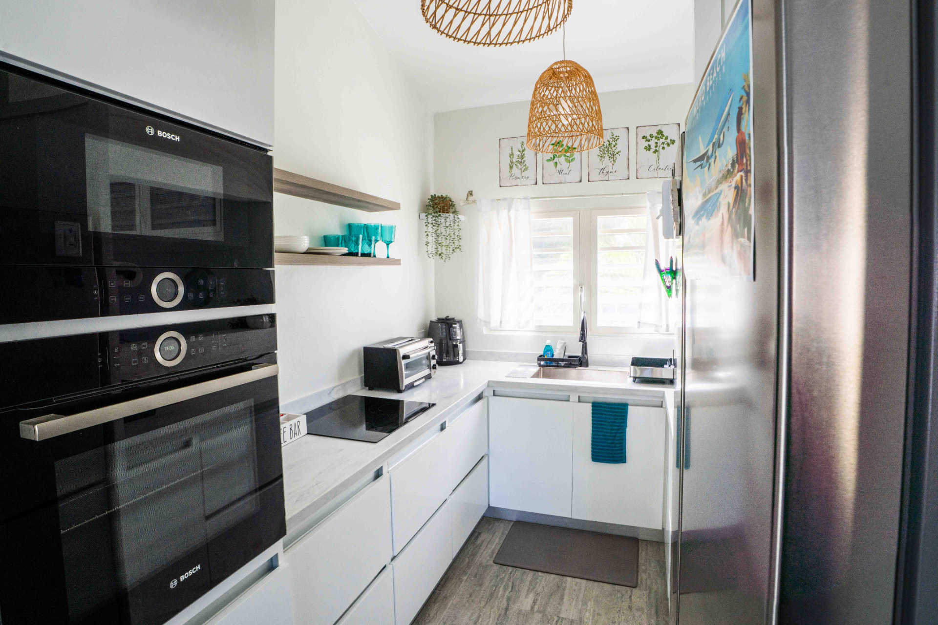 Fully equipped kitchen with induction stove, oven, coffee bar and toaster